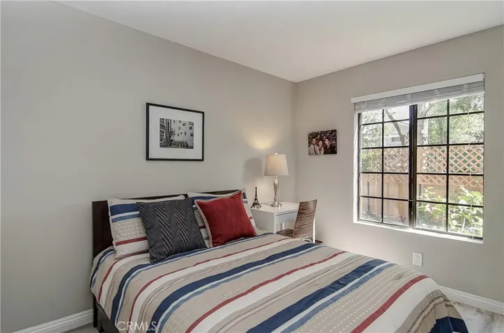 Roomy secondary bedroom....perfect for guests, family, or lovely home office with garden view.