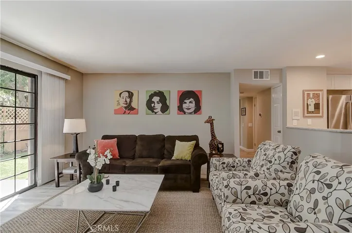 Contemporary urban vibe with open great room concept, plus large patio and yard area!
