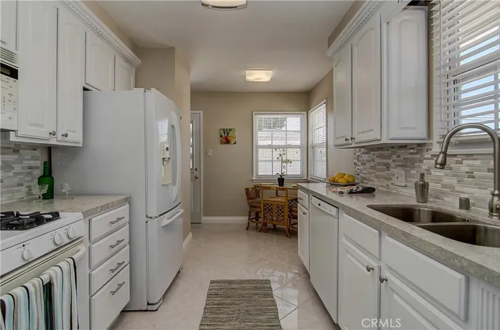 Two dining options- The kitchen nook with sunny corner window....