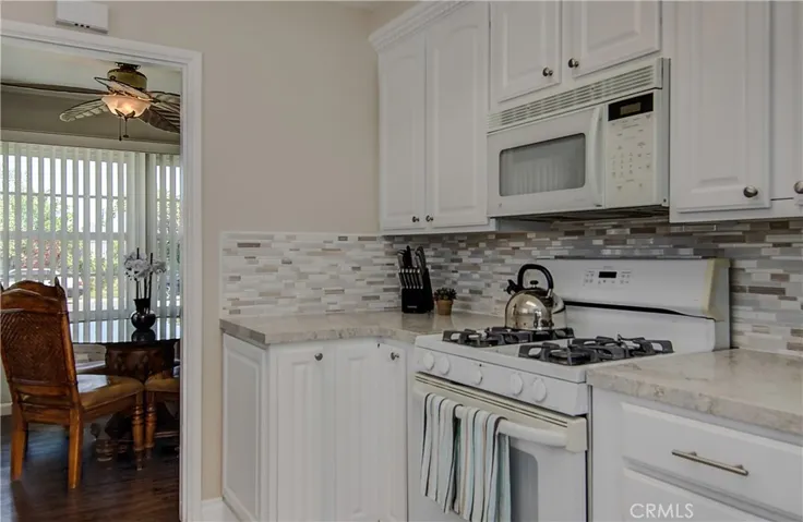 Or the Formal Dining room, seen here. Isn't that kitchen backsplash gorgeous?