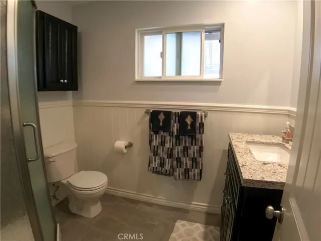 Newly remodeled bathroom closest to kitchen and laundry room.