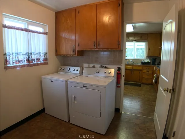 Separate laundry room with gas hookups.