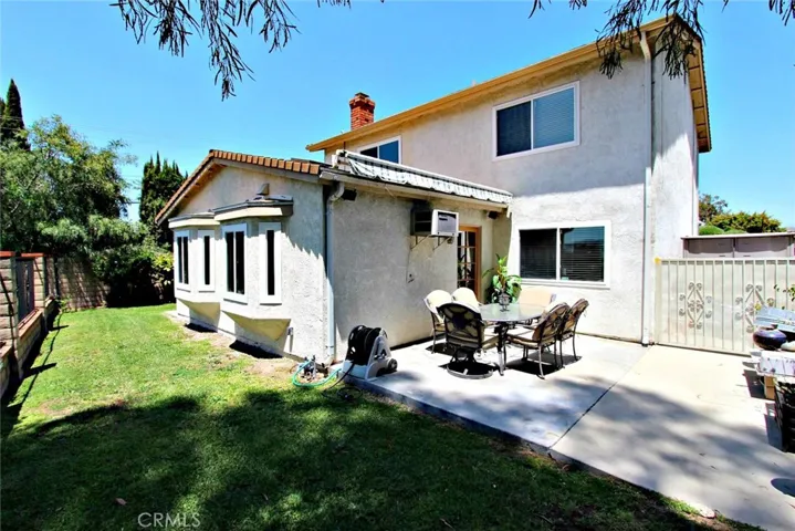 Retractable awning is closed, when it's expanded it provide nice shade in the backyard.