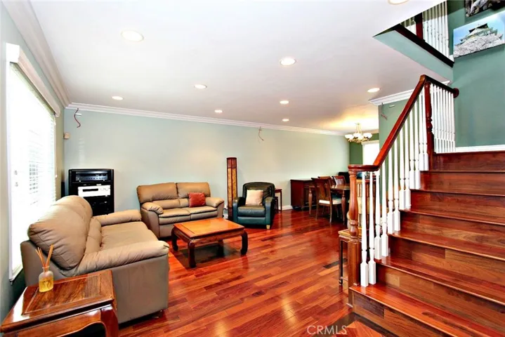 Living room with wired for surround sound speakers.
