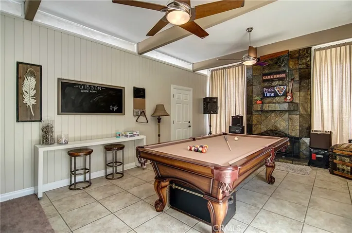 Living room with direct access to the garage is currently being used as a music/game​​‌​​​​‌​​‌‌​‌‌​​​‌‌​‌​‌​‌​​​‌​​ room.