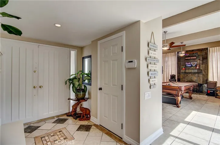 Double door entry leads immediately into the living room.