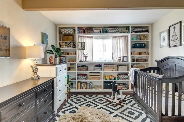 This bedroom just off of the family room can also be used as a formal dining room.