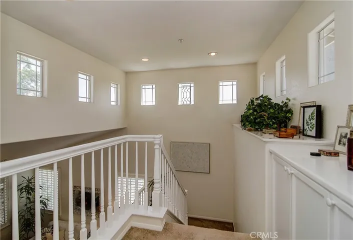 Upstairs Landing has linen storage and display shelves.
