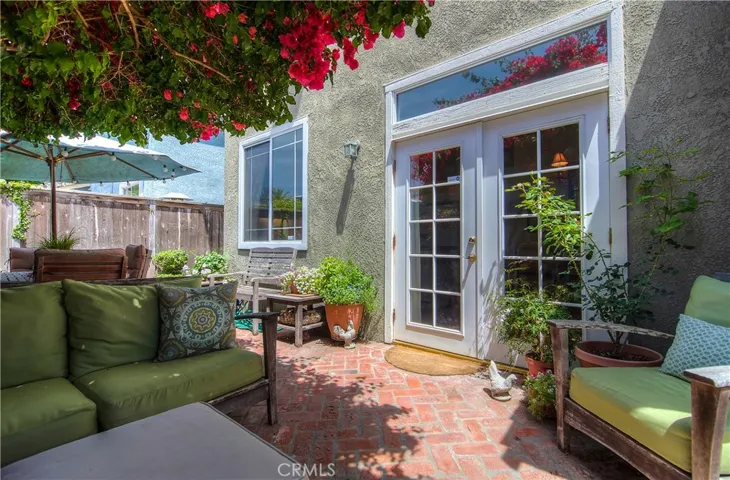 Gorgeous brick pavers grace the back patio.