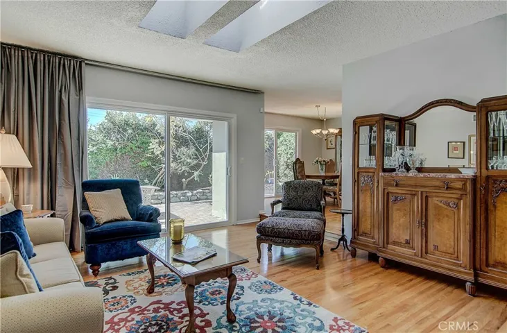 THE TOP FIVE REASONS WHY THIS IS AN AWESOME HOME!.....#1. Light Floods into the Formal Living Room. Gorgeous HARDWOOD FLOORS Abound.......