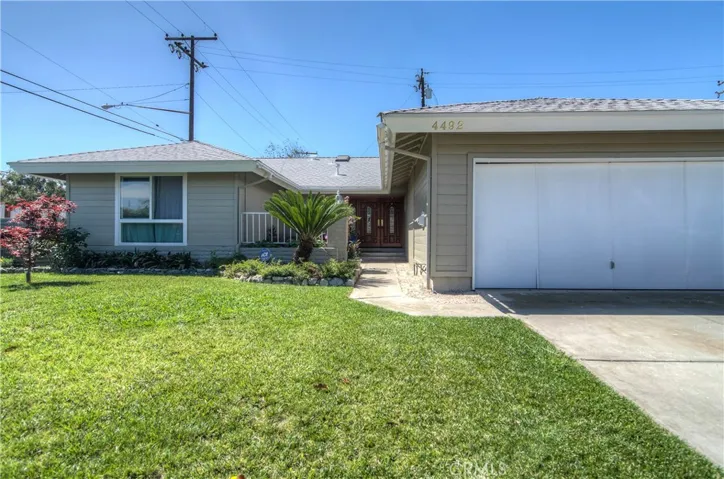 Lush Lawn and a nice set back from the street, create a stately curb appeal.
