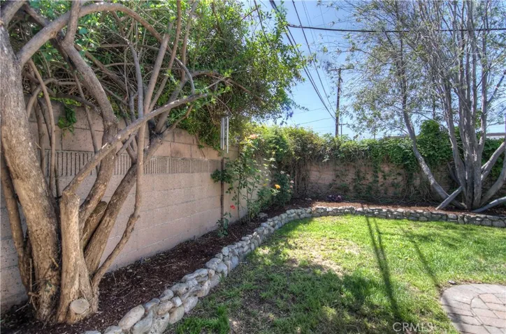 Sturdy block wall fencing really secures the private rear yard.