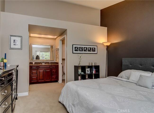 SOARING CEILINGS are just one great feature of this Bedroom, one of 2 Master Suites!