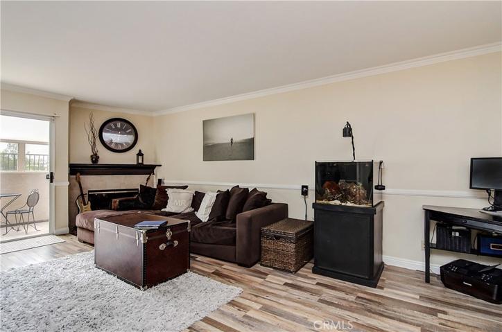 CORNER FIREPLACE AND ROOM FOR OFFICE NICHE enhance the oversized Great Room.