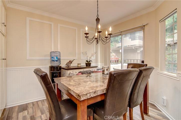 CROWN MOLDING & FLOOR TO CEILING PANTRY in the Sun filled Dining Room.