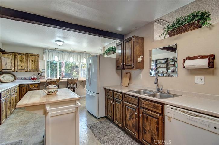 Counter and Cabinet Space Galore;  Plus Breakfast Bar in the Sunny Kitchen.
