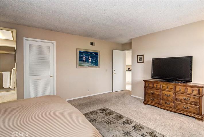 Spacious walk-in closet and bath with separate dressing/vanity area and large shower round out this master suite.
