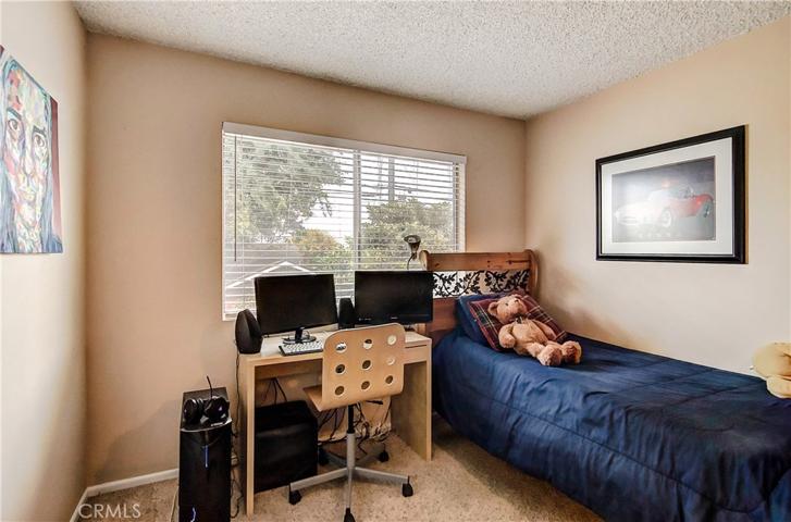Secondary bedroom with double doors would make super den/home office.