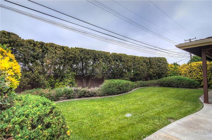 Imagine playing with the kids and/or dogs on this lush lawn! Not a neighbor in site, ahh... the privacy!