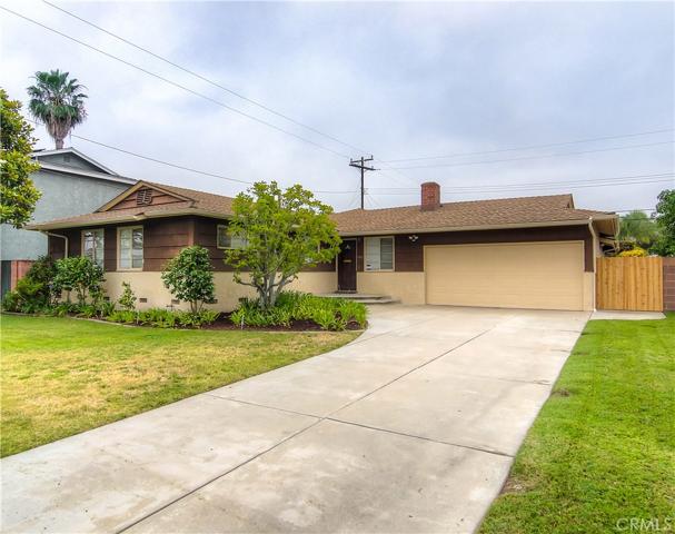Get a quick feel for the home: Note the deep set back and extra long Driveway!