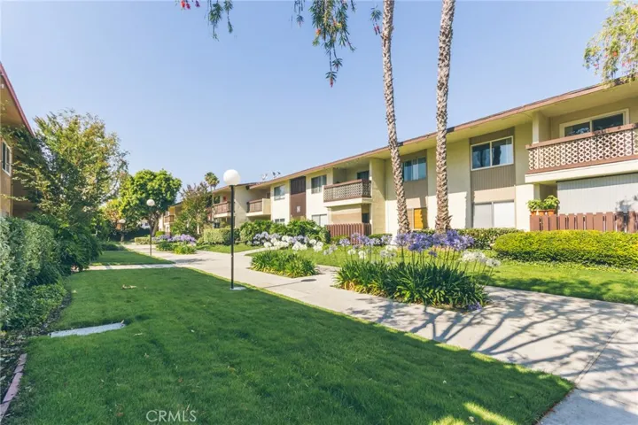 Desirable top floor Garden Style condominium located in a quite area at the rear of the community and just steps from the Rossmoor Center!