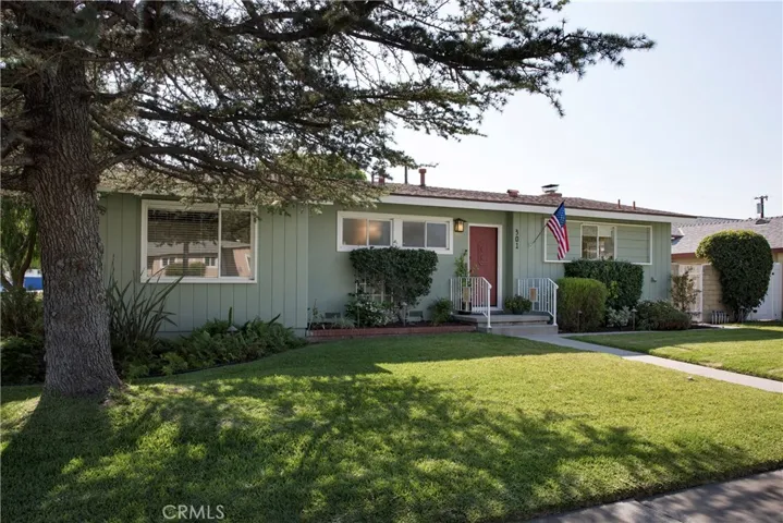 The beautiful curb appeal of this Sunny Hills High School single level home sets the stage.