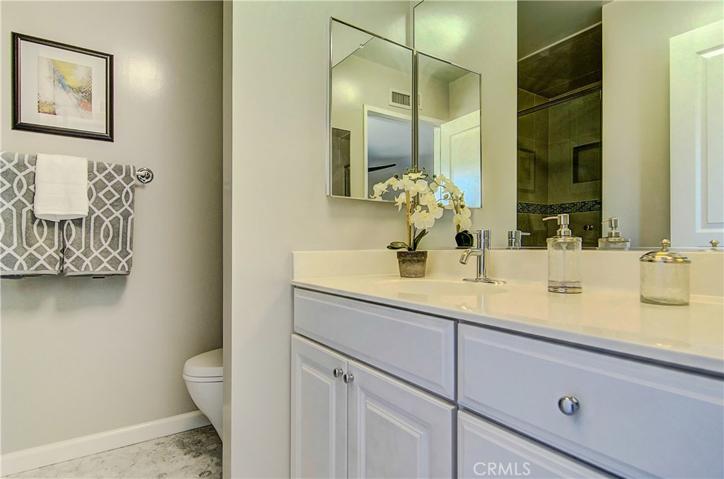 Newly renovated bath will all new tile to flooring and shower.