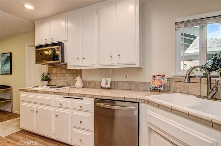 What cook doesn't like a window at the kitchen sink?...we've got two, plus all new Energy Efficient LED lighting. And you'll love the freshly painted Cabinets too!