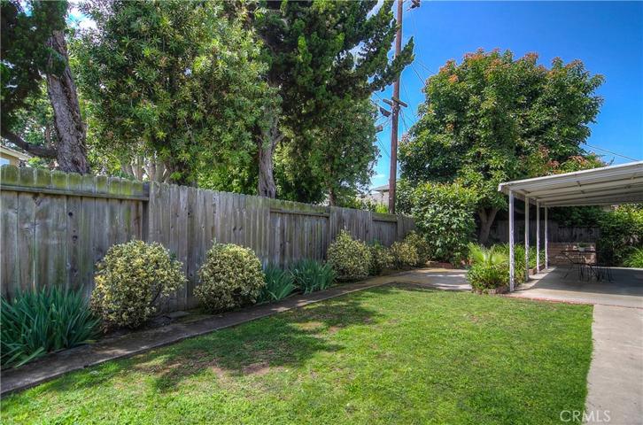 Rear yard is a sunny, private oasis...or...there is room for a pool...