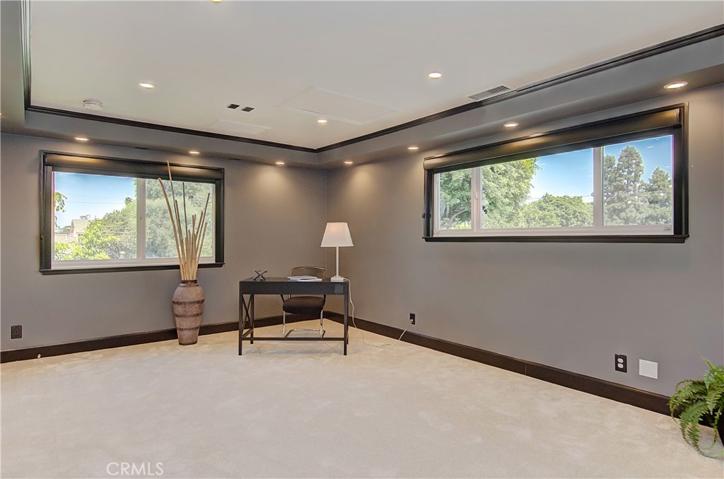 Check out the beautiful moldings, tray ceiling and lighting details. Blackout shades and walk-in closet add to the varied options