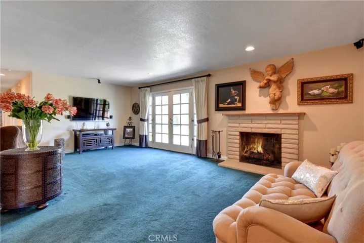 Spacious living room with a cozy fireplace