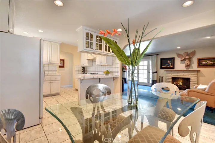 View of living room and kitchen from dining area