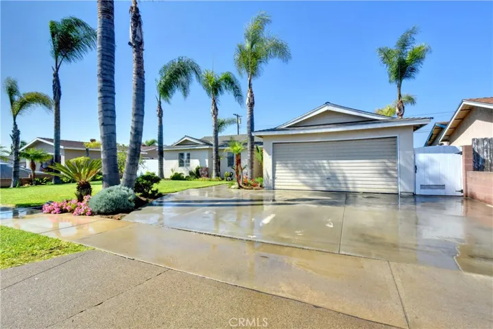 Front view showing the large driveway