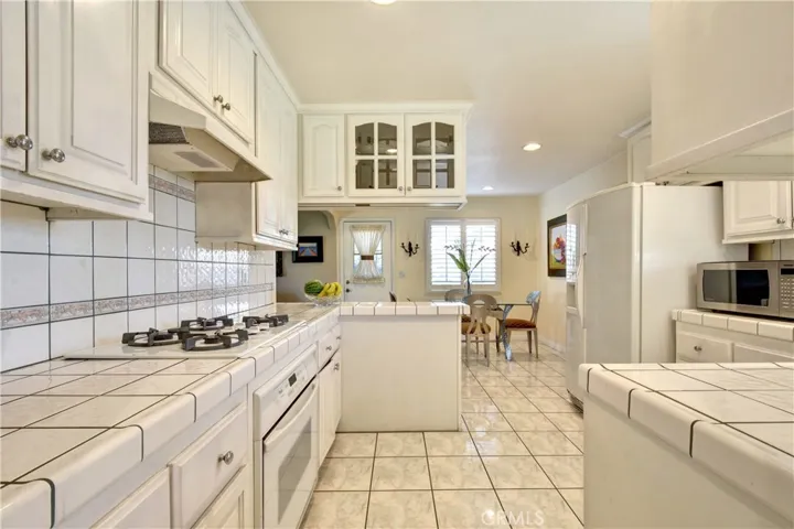 View of dining area through the spacious kitchen