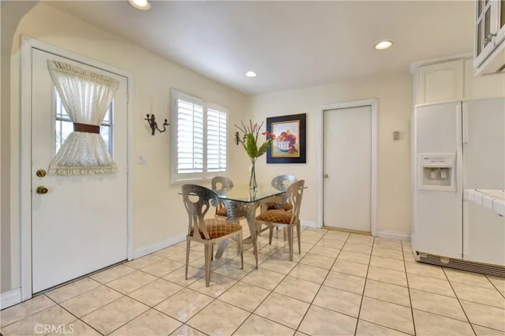 View of dining area with direct access to the 2-car garage