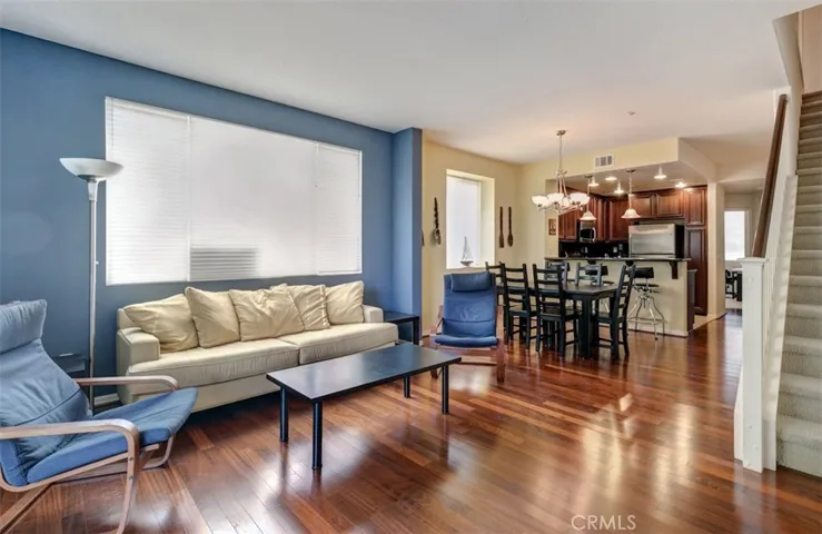 Engineered wood floor covering living room and dining room