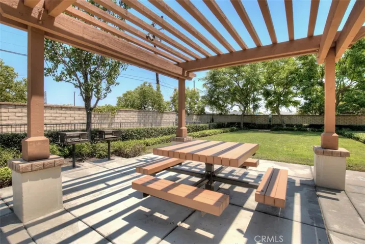 Common area is fully enclosed by block privacy wall.