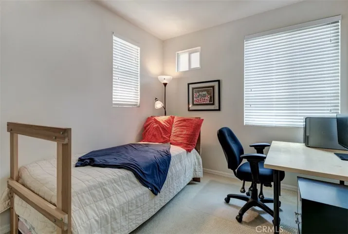 Bedroom  2 of 3 - Corner location affords additional windows for good ambient lighting