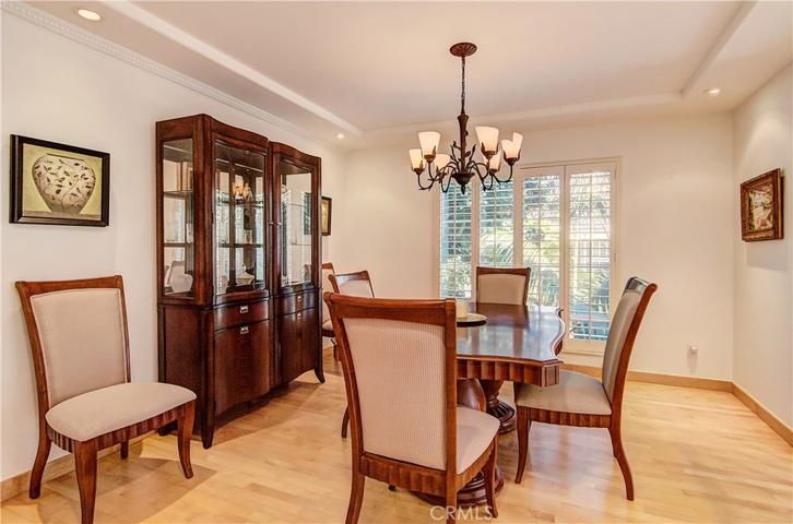 Formal dining room is perfect for large dinner parties or intimate gatherings...note lovely ceiling details.
