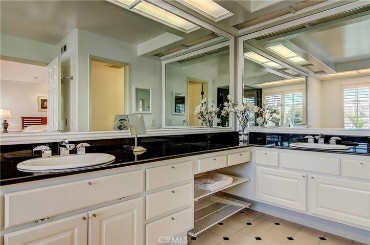 Loads of storage and counter space in this dual vanity master bath.