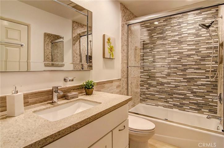 Gorgeous hall bath is convenient to secondary bedrooms.