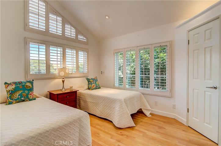 All bedrooms are spacious with great details...have you noticed the CUSTOM designed Plantation Shutters in every room?