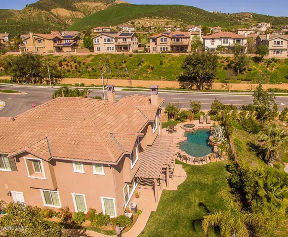 Tile Roof, Grassy Backyard
