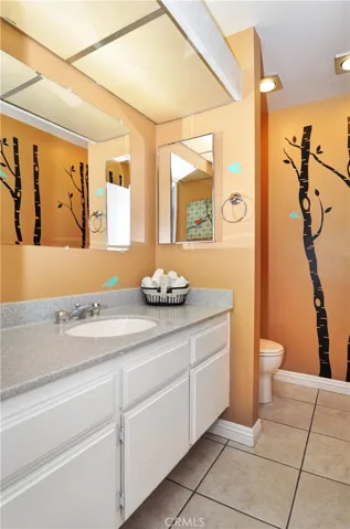 As you enter the home the door to your left is the remodeled down stairs half bathroom.