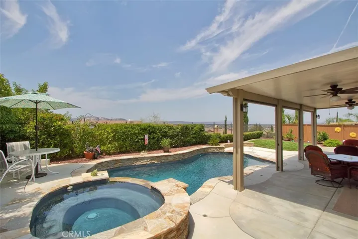 Pool, Spa and Alumawood Patio Cover With Views In Background