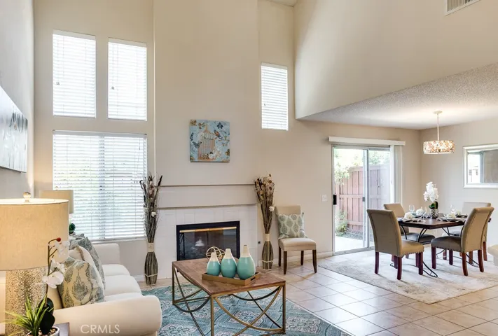 Sunny Dining room opens to living room
