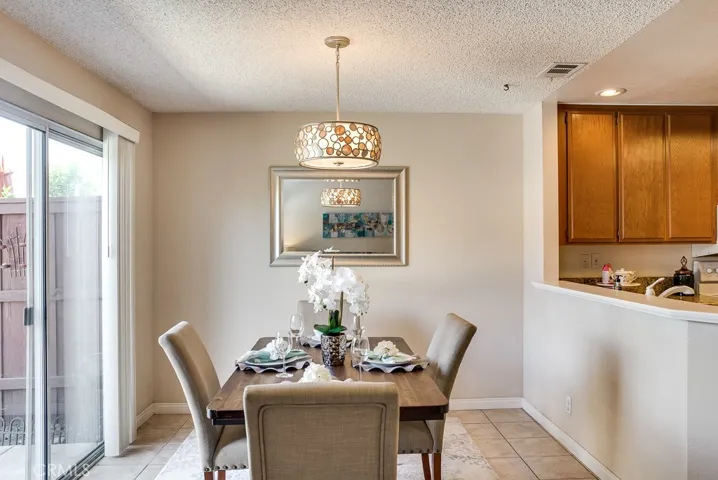 Freshened dining area opens to patio