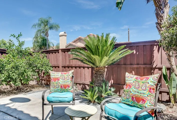 Relax and unwind in your private ground floor patio.  Fruit bearing lime tree, mature sago palm, and giant bird of paradise plus room to add flowers make this patio a garden oasis.