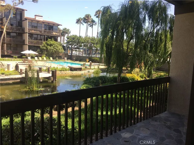 View of the pool and spa from the flagstone private patio of 7110 Marina Pacifica Dr. Long Beach 90803