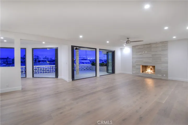 Living Room with tri-quad folding patio doors